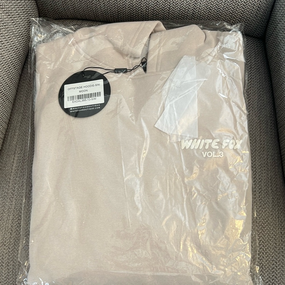 Brand New White Fox Boutique hoodie. Size S/M. Color: Moon. Original bag.